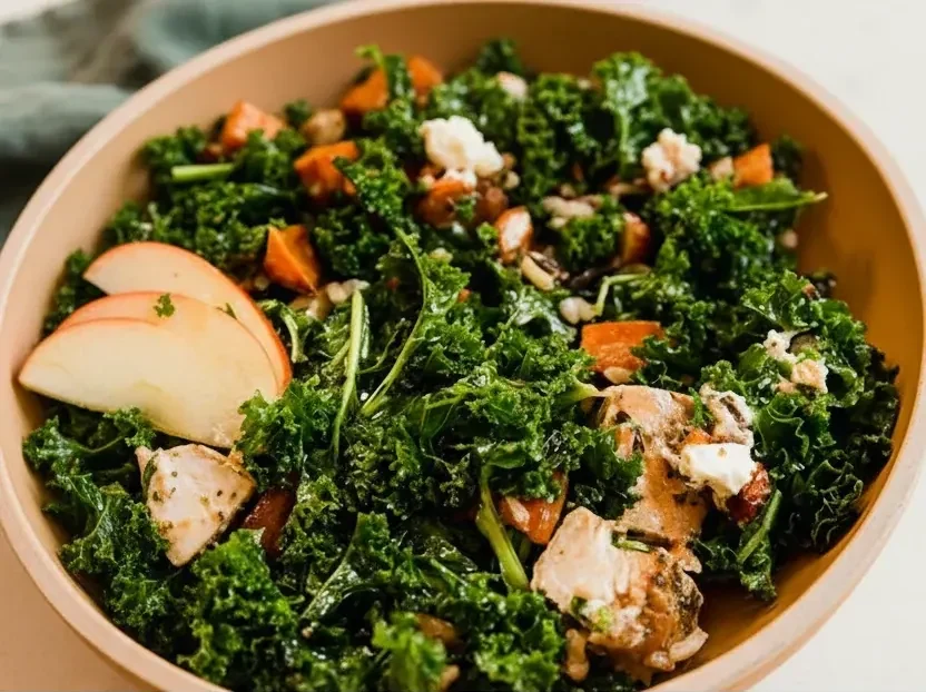 Roasted chicken and kale salad with sweet potatoes and apples, healthy meal prep options for weight loss and nutrient-rich eating.